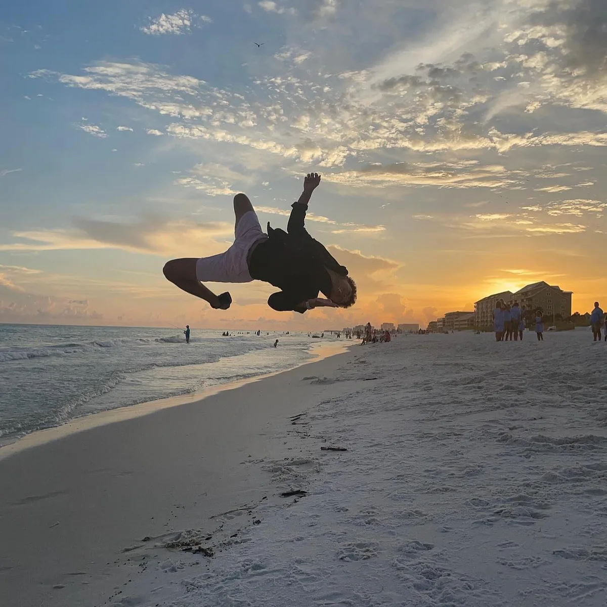 A flip above the sand with a beach in the distance
