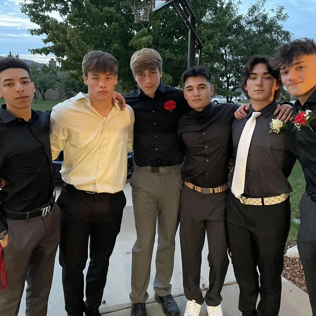 A group photograph in formal clothes